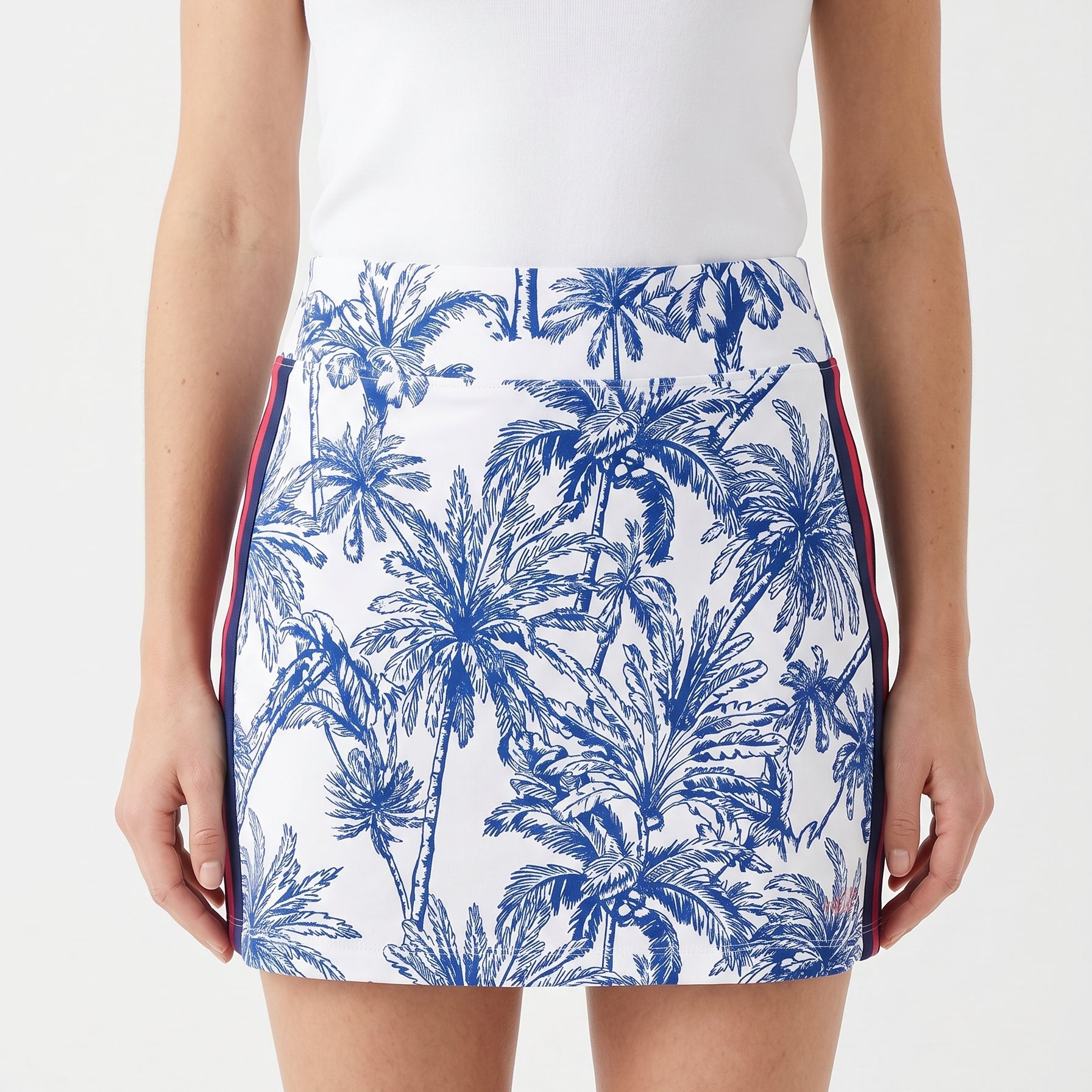 Tropical palm tree patterned skirt with white background