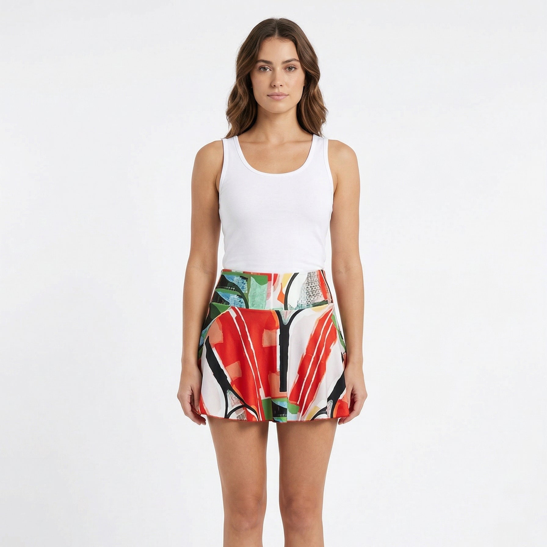 women waring red green and black tennis skirt